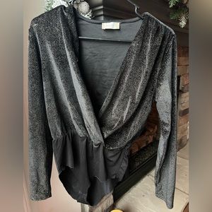 Black and gold bodysuit